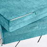 Close-up view of the soft fabric hinged panel covers in tropical-teal color with one partially unzipped and the other showing a handle